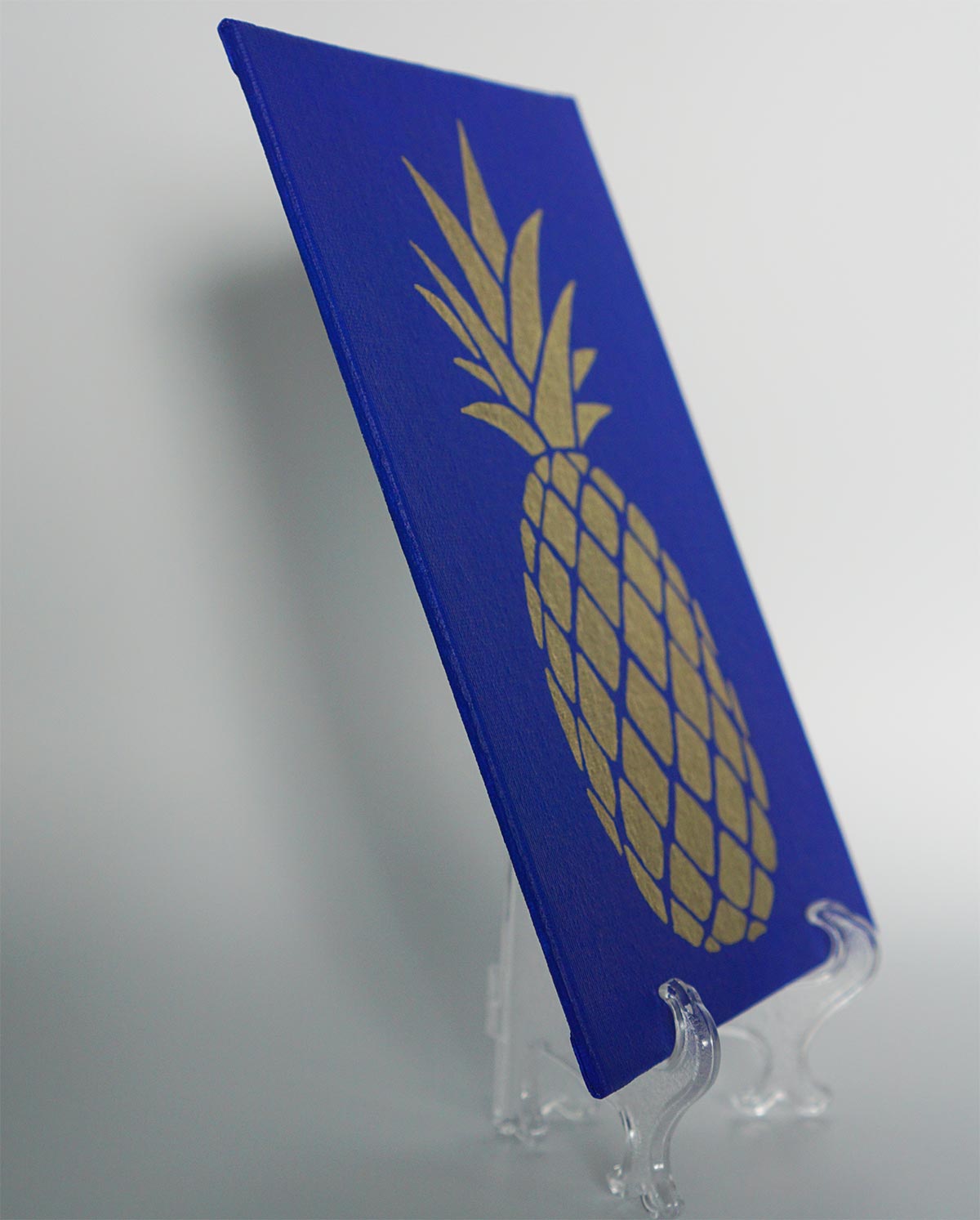 Gold Pineapple on Blue Canvas